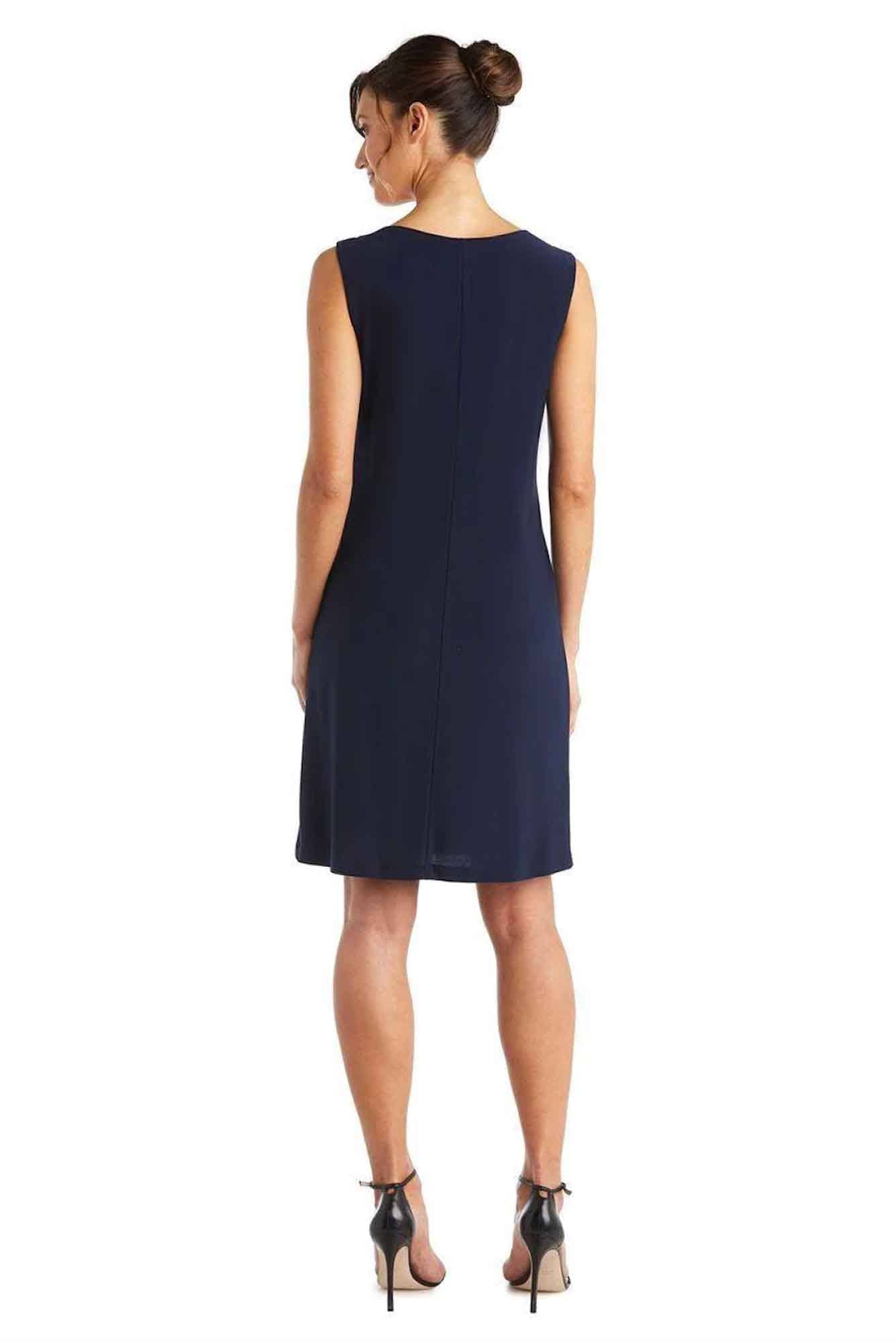 Lois & Co Navy Knit Dress with Matching Embellished Waterfall Jacket. Dress back view.